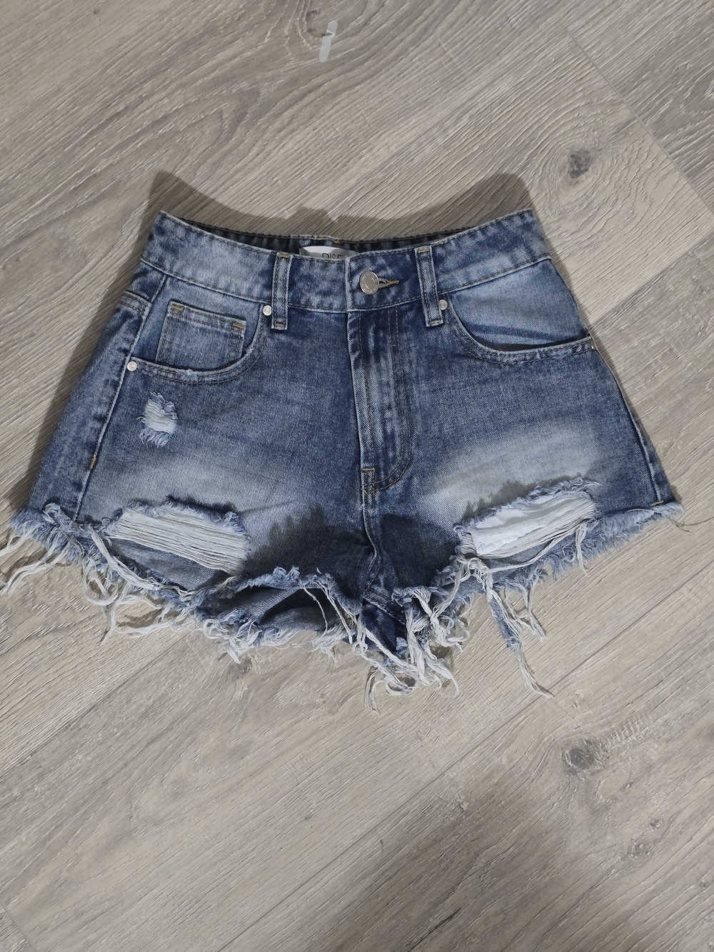 Women's Distressed Blue Denim Cutoff Shorts - High Rise